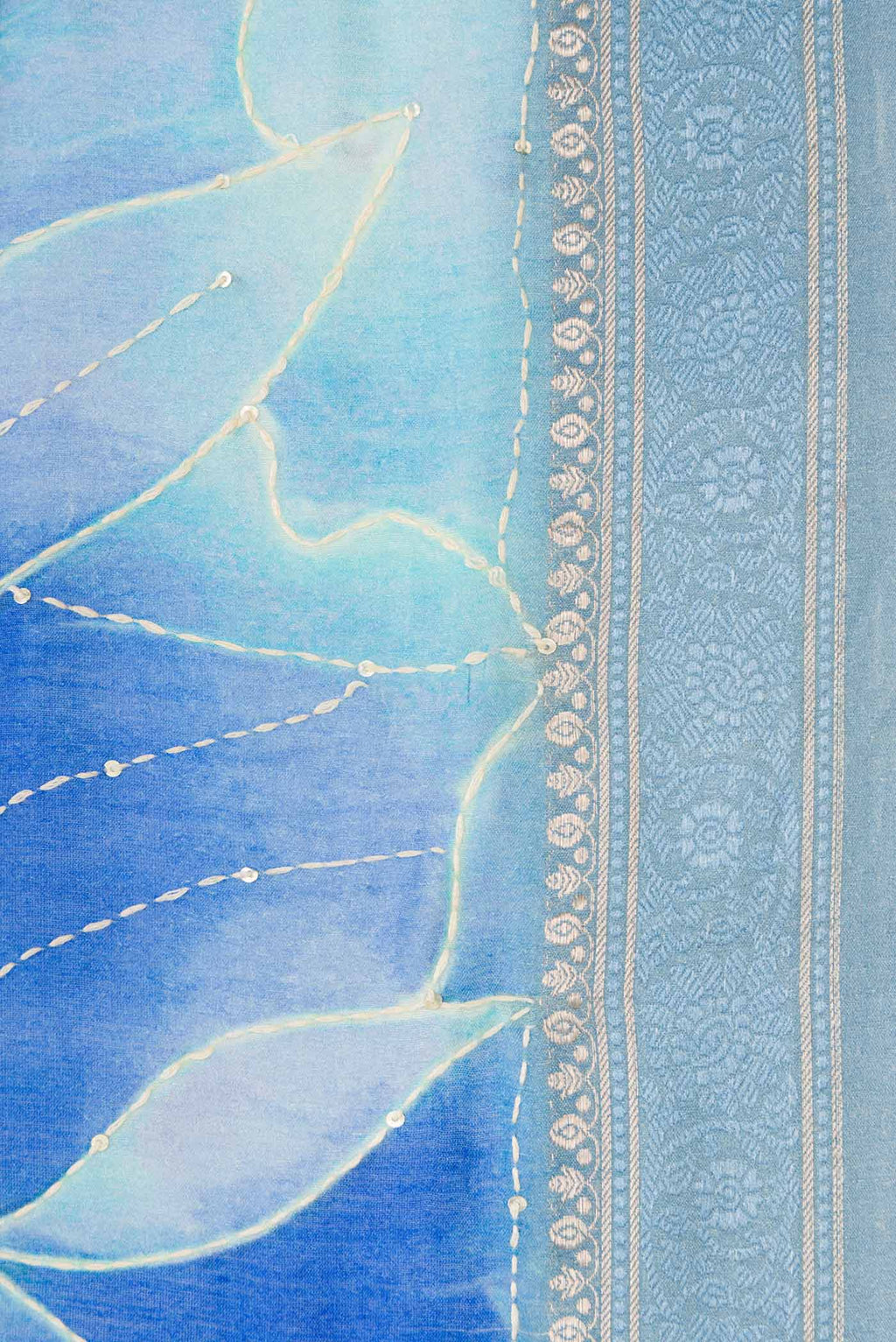 Border image of Blue Dual Tone Tussar Silk Saree with Printed design on the body and Zari Border