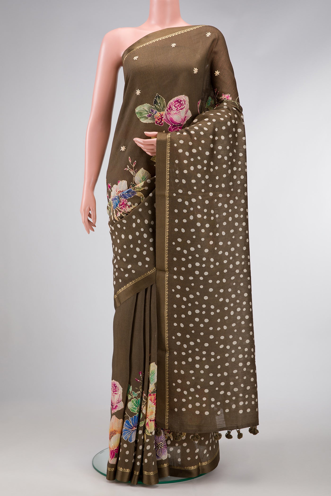 Mehandi Green Dual Tone Tussar Silk Saree with Embroidery on the body and Thin Zari Line.  displayed on a mannequin