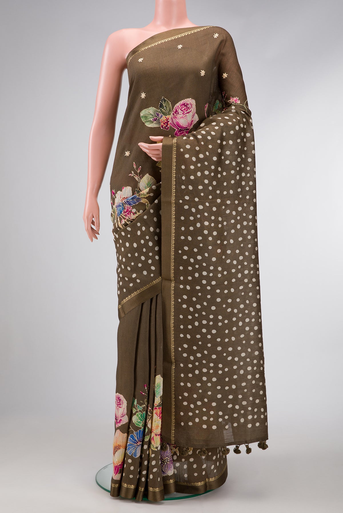 Mehandi Green Dual Tone Tussar Silk Saree with Embroidery on the body and Thin Zari Line.  displayed on a mannequin