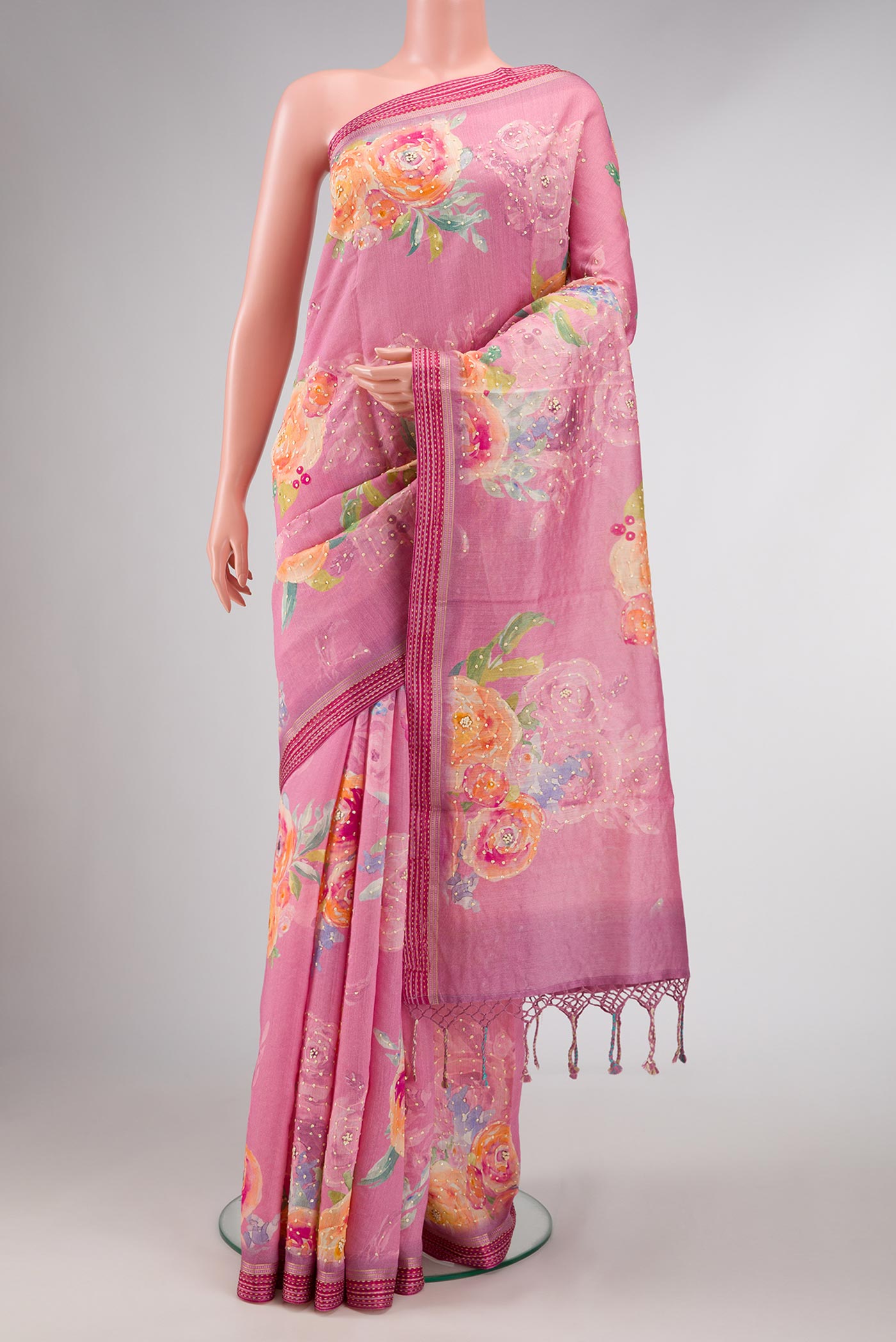 Pink Dual Tone Tussar Silk Saree with Printed design on the body and Zari Border displayed on a mannequin