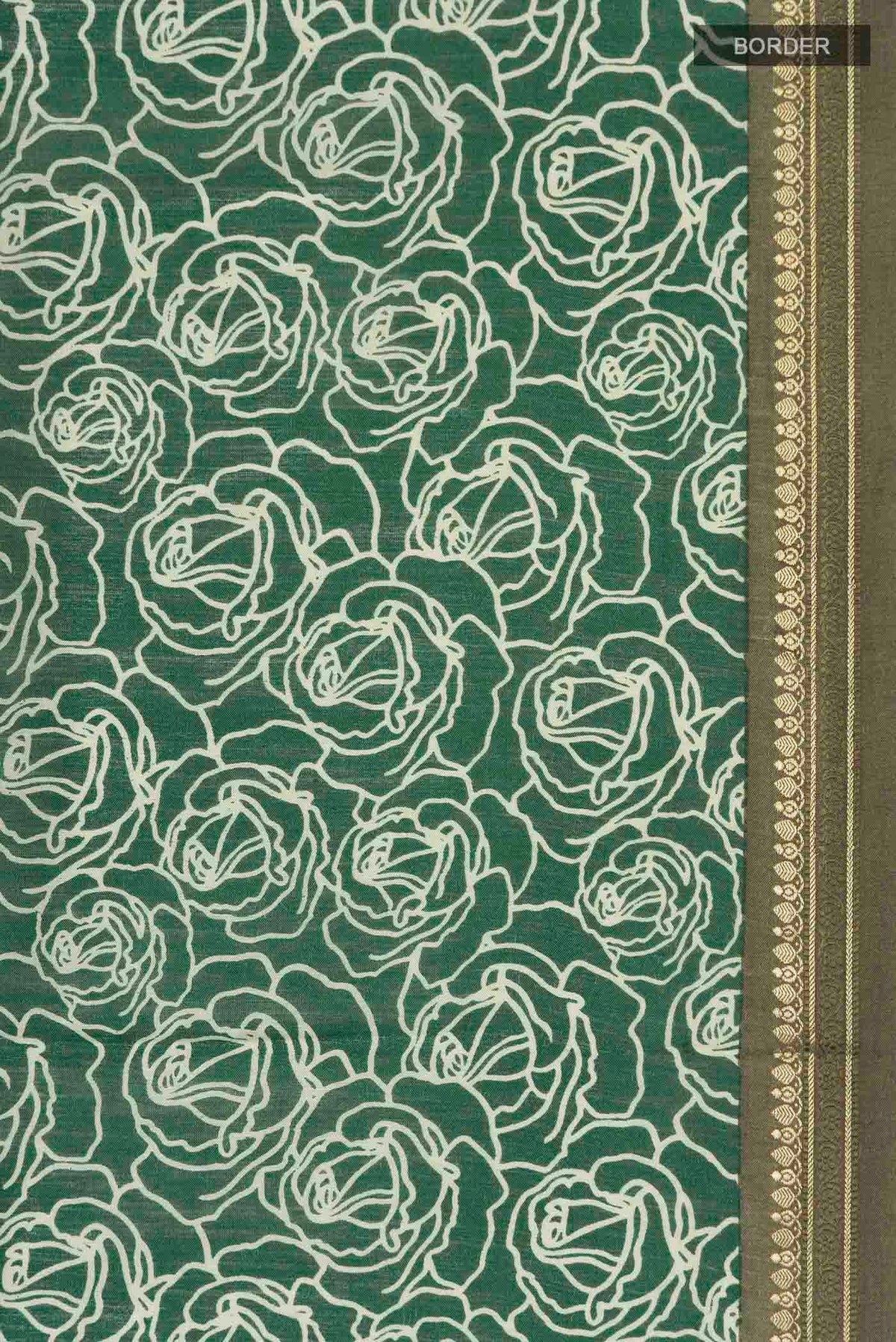 Border image of Green Tussar Silk Saree with Printed design on the body and Zari Border