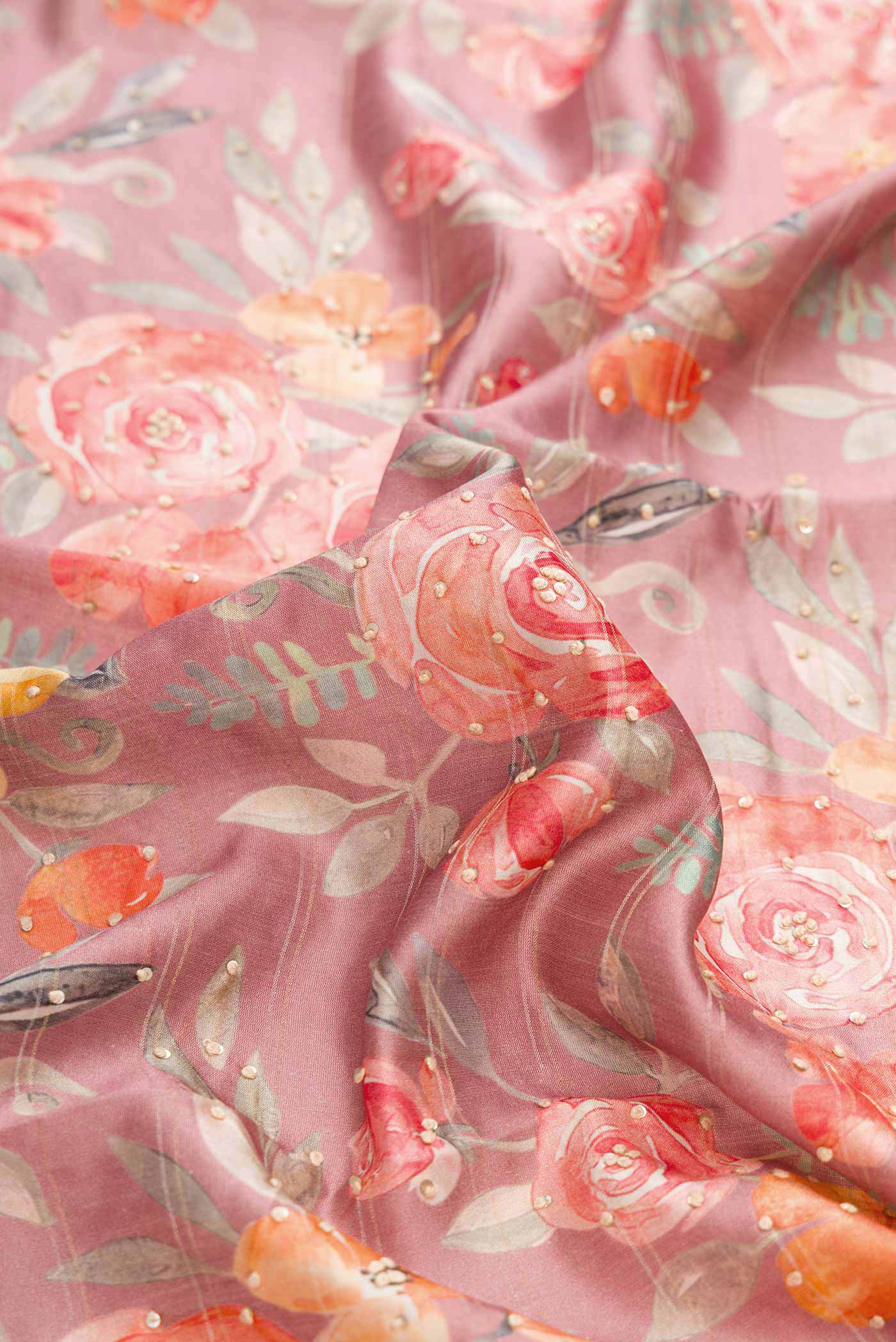Close up of Pink Dual Tone Tussar Silk Saree with Printed design on the body and Plain Border displaying folds