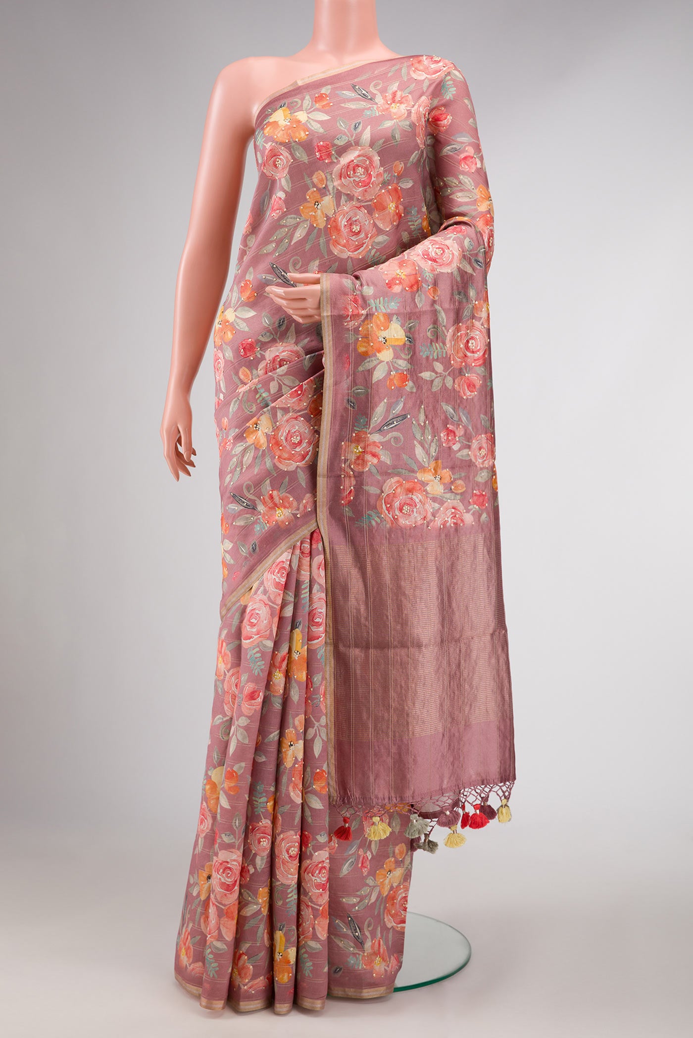 Pink Dual Tone Tussar Silk Saree with Printed design on the body and Plain Border displayed on a mannequin