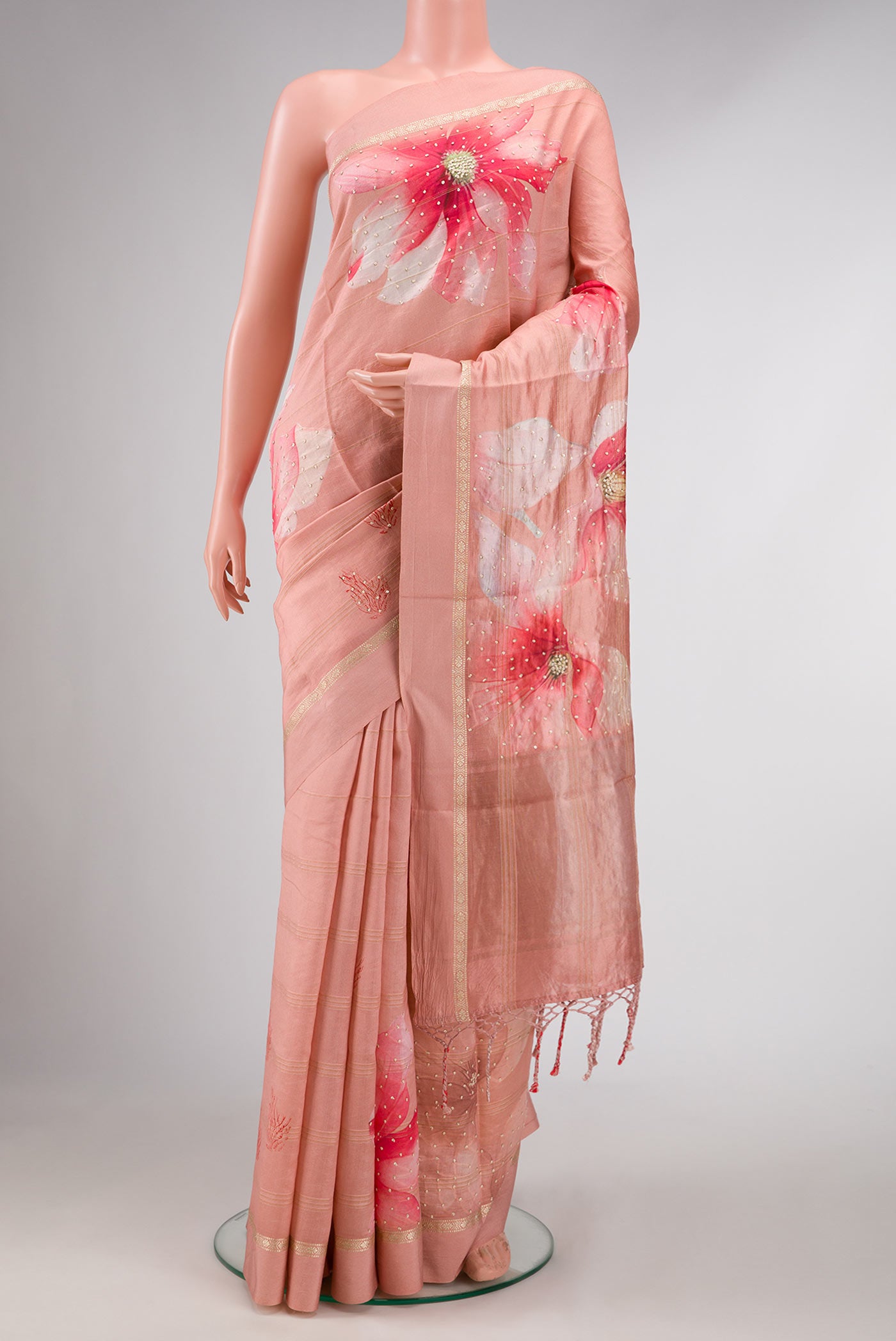 Pink Dual Tone Tussar Silk Saree with Embroidery on the body and Zari Border displayed on a mannequin