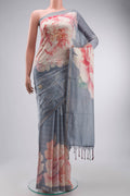 Grey Tussar Silk Saree with Embroidery on the body and Zari Border displayed on a mannequin