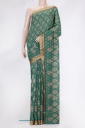 Green Dual Tone Tussar Silk Saree with Printed design on the body and Zari Border.  displayed on a mannequin