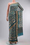 Blue Bhagalpuri Tussar Silk Saree with Printed design on the body and Zari Border displayed on a mannequin
