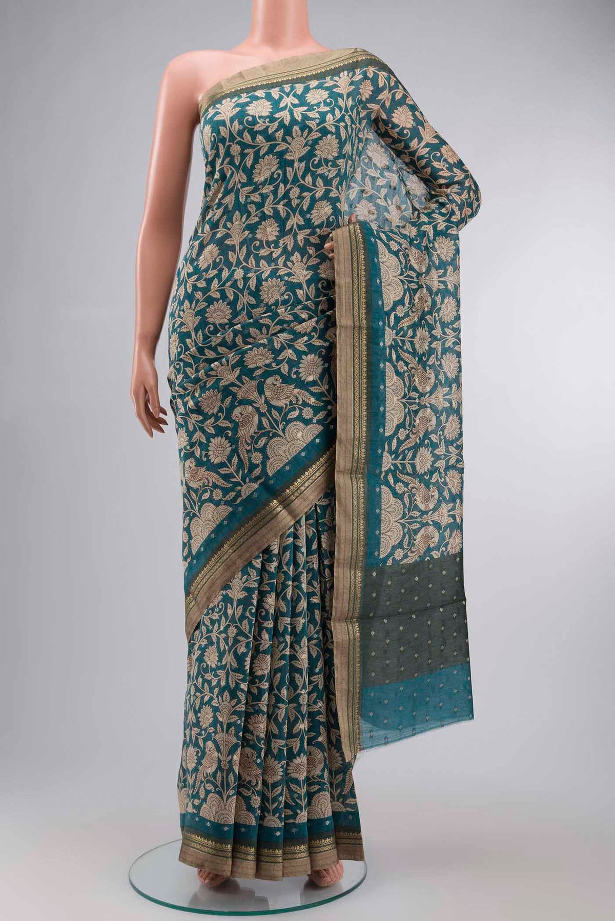 Blue Bhagalpuri Tussar Silk Saree with Printed design on the body and Zari Border displayed on a mannequin