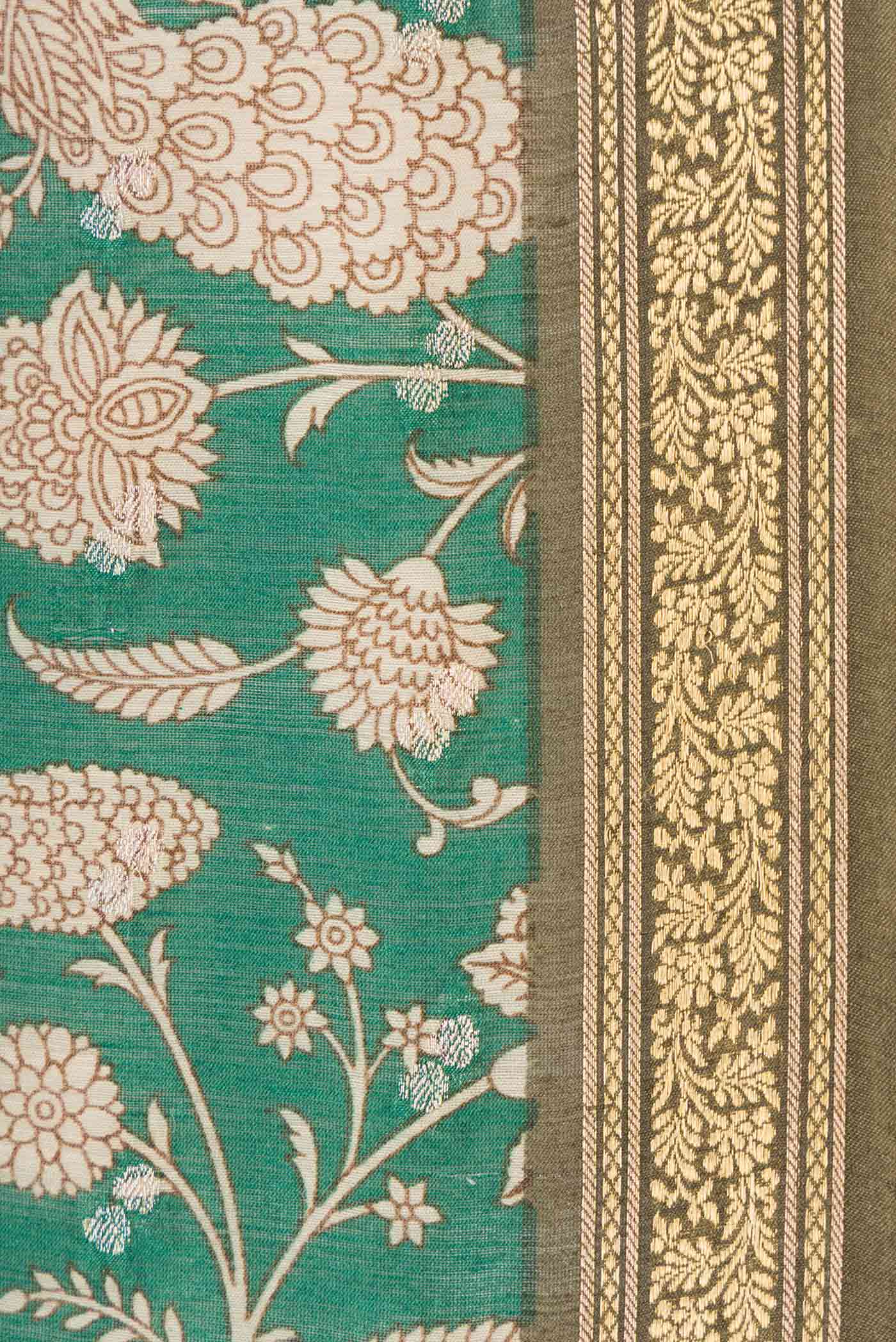 Border image of Green Dual Tone Tussar Silk Saree with Printed design on the body and Zari Border