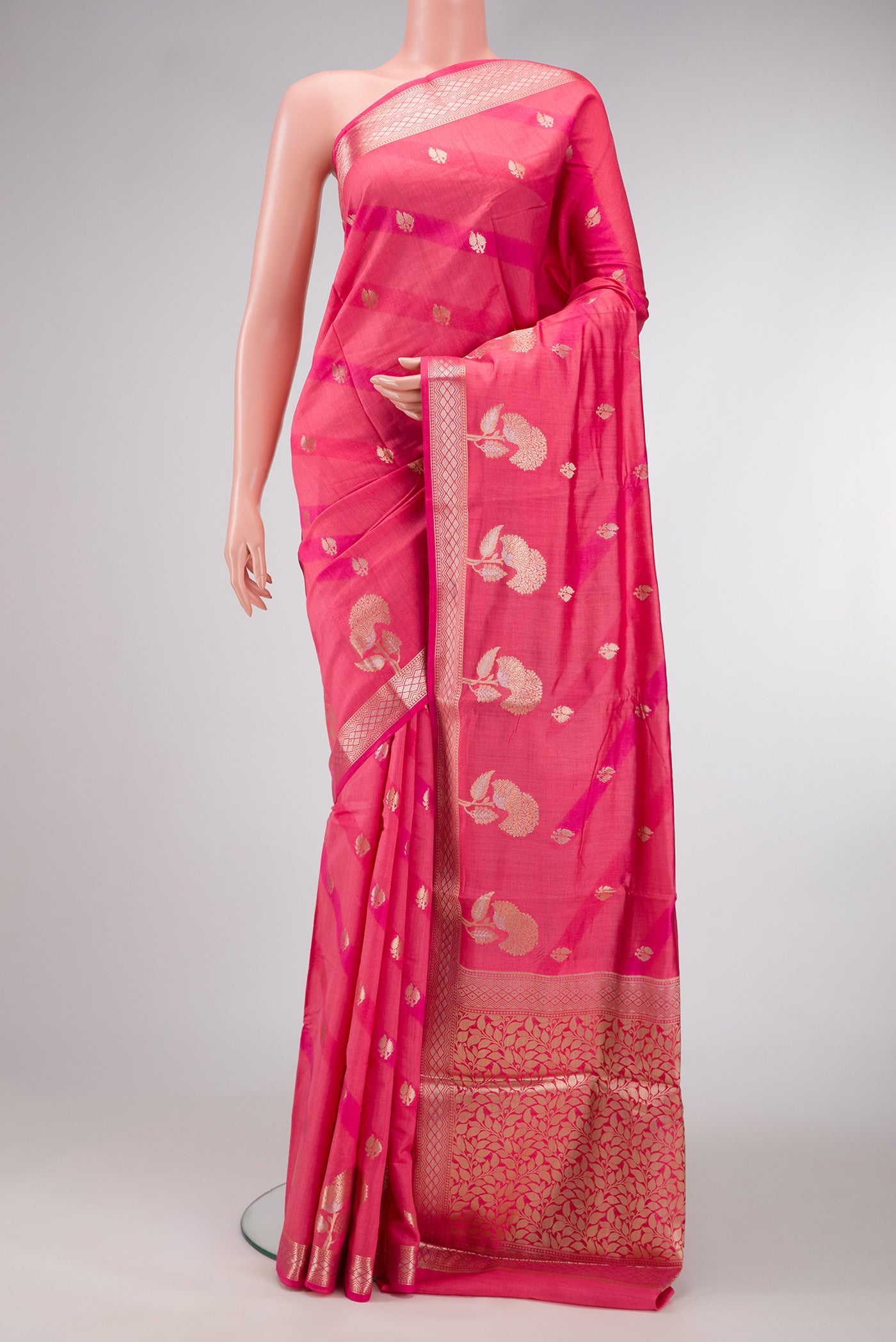 Pink Dual Tone Tussar Silk Saree with Zari Butta on the body and Zari Border.  displayed on a mannequin