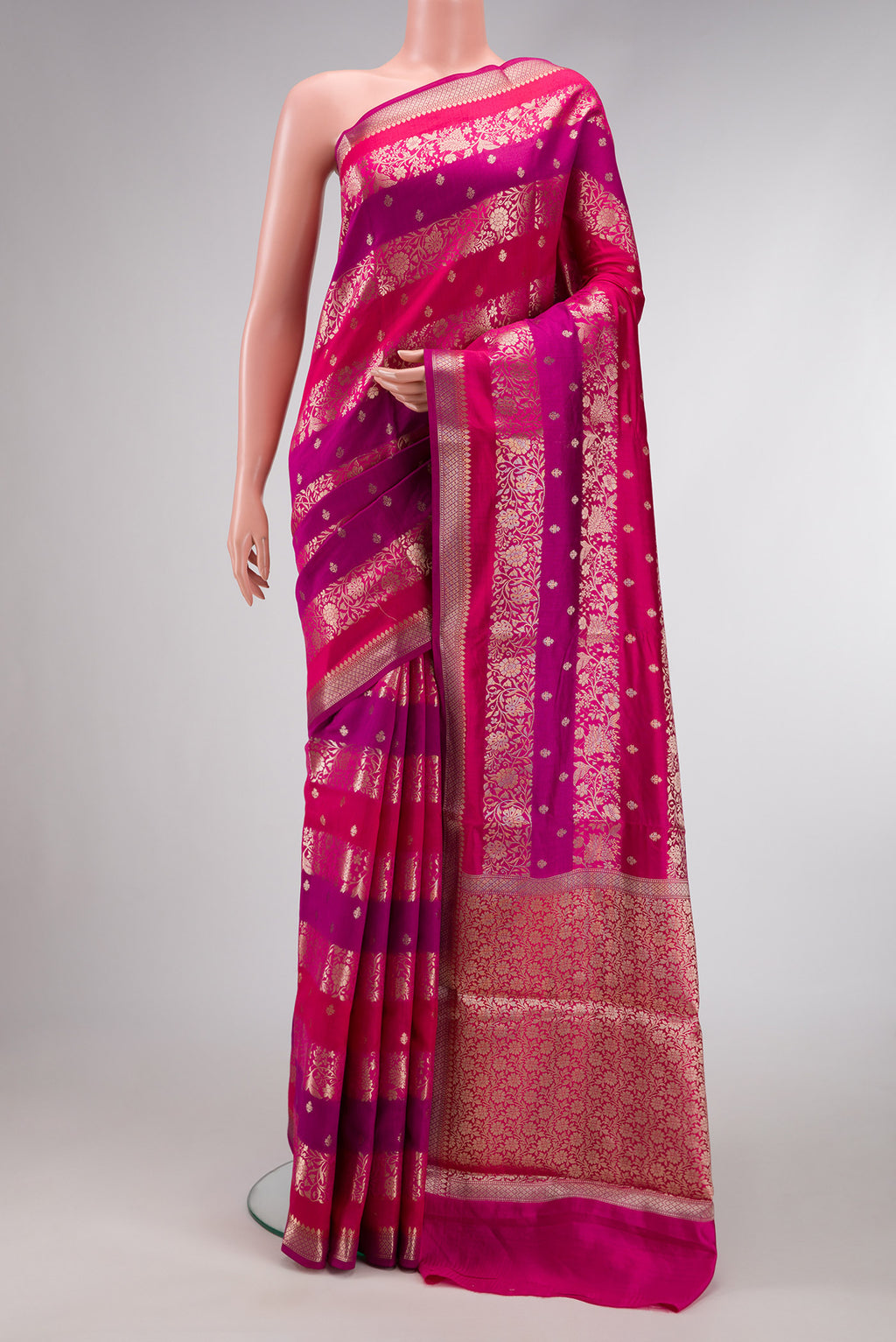Purple and Maroon Color Tussar Silk Saree with Zari Butta on the body and Zari Border.  displayed on a mannequin