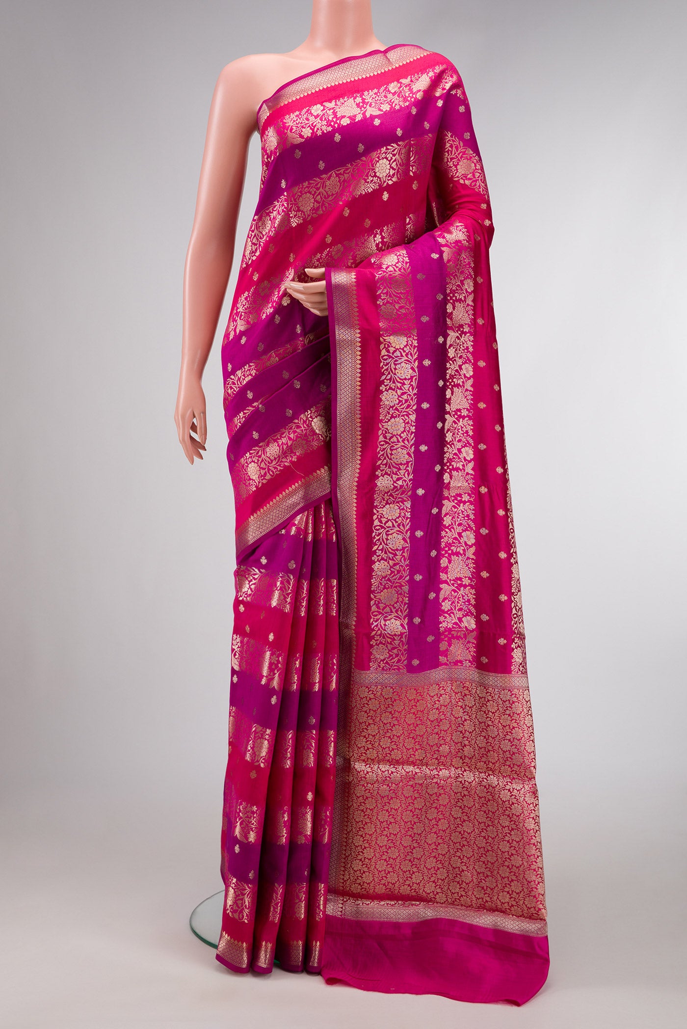 Purple and Maroon Color Tussar Silk Saree with Zari Butta on the body and Zari Border.  displayed on a mannequin