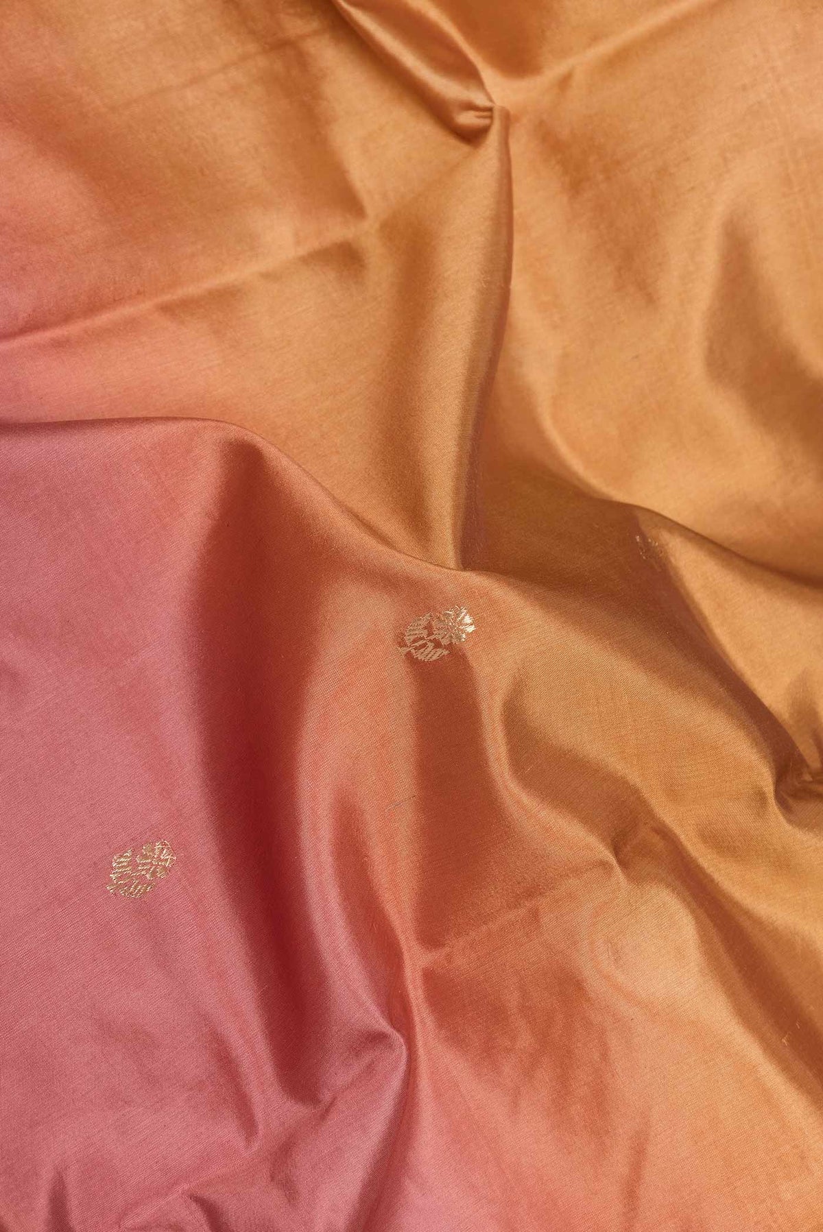Close up of Multi Color Tussar Saree with Zari Butta on the body and Fancy Border displaying folds
