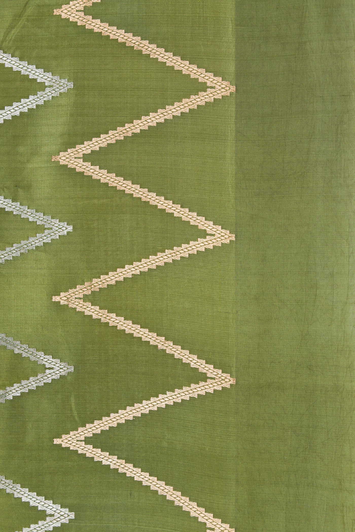 Border image of Sandal, Grey and Green Color Tussar Silk Saree with Zari Butta on the body and Plain Border. 