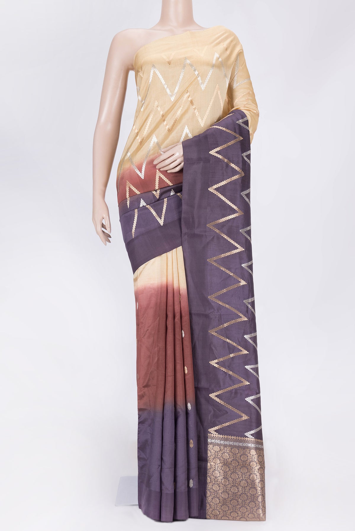 Multi Color Tussar Saree with Zari Brocade on the body and Plain Border displayed on a mannequin