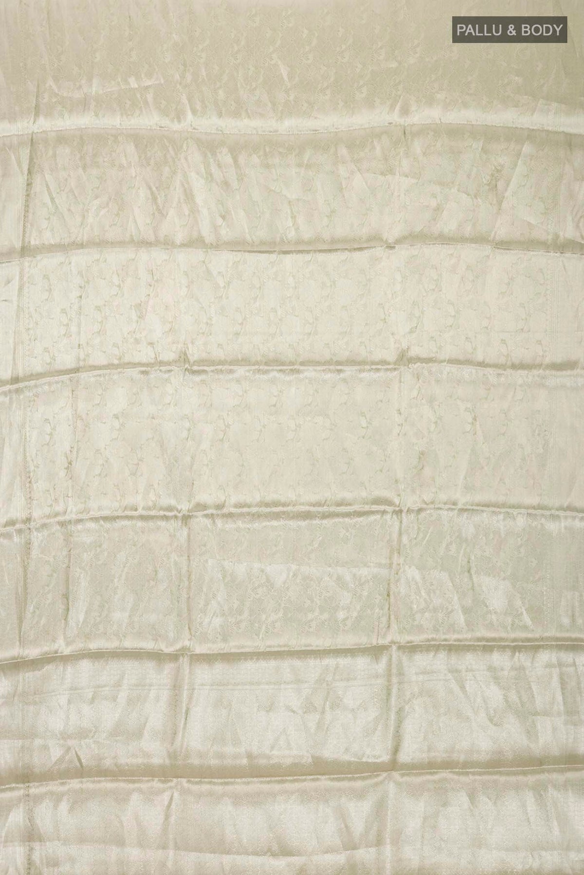 Flat view of Green Tissue Silk Saree with Zari Brocade on the body and Zari Border