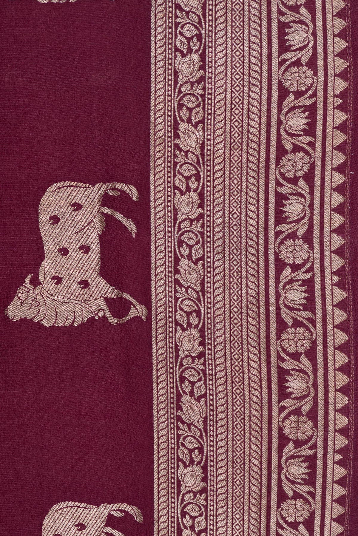 Border image of Maroon Dual Tone Tussar Silk Saree with Zari Butta on the body and Zari Border. 
