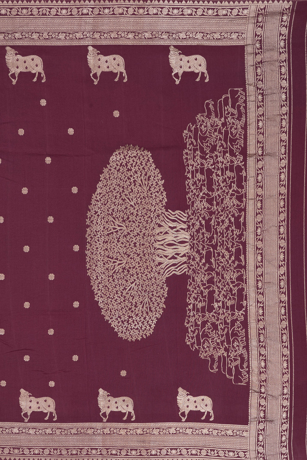 Close up image of the pallu of Maroon Dual Tone Tussar Silk Saree with Zari Butta on the body and Zari Border. 