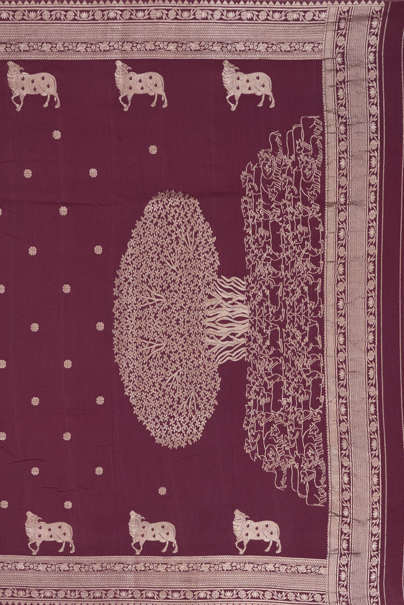Close up image of the pallu of Maroon Dual Tone Tussar Silk Saree with Zari Butta on the body and Zari Border. 