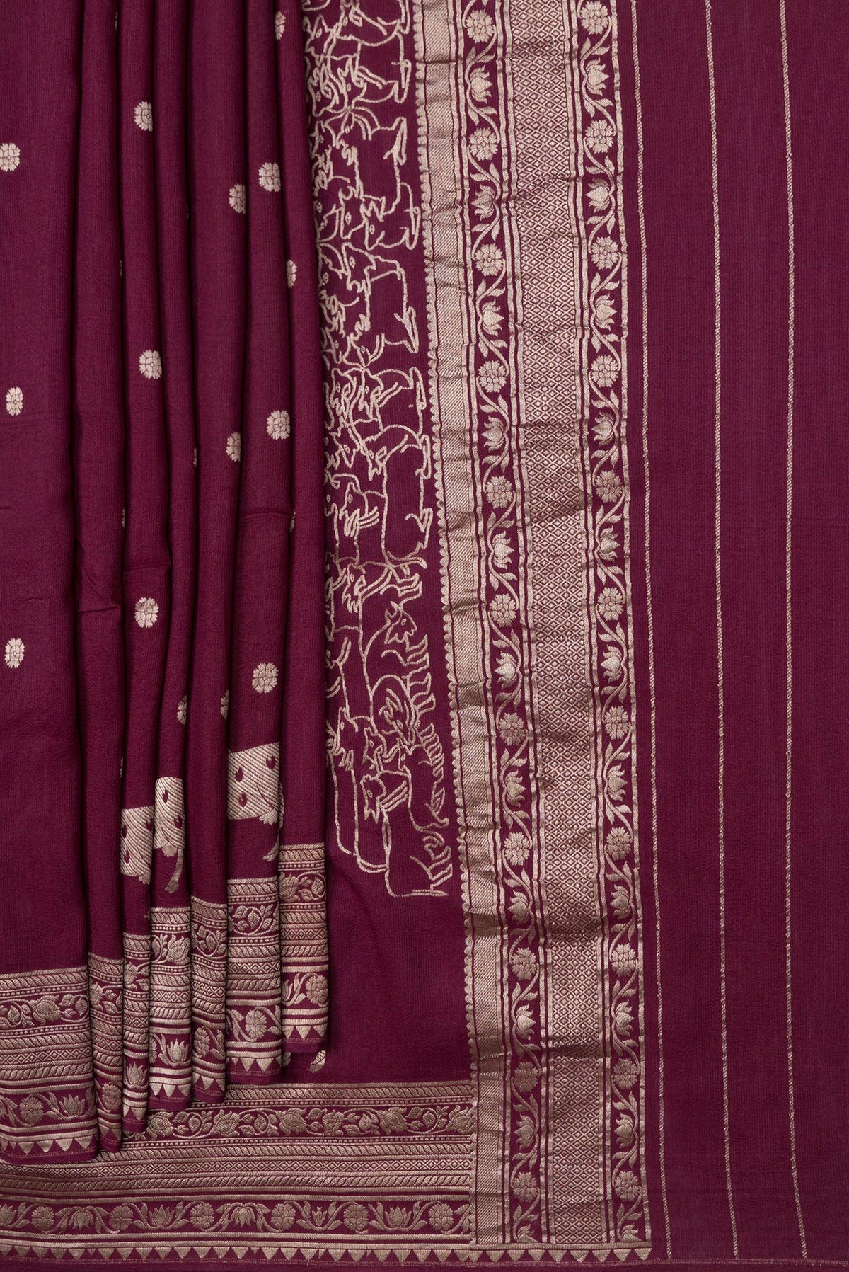 Pleats and pallu of Maroon Dual Tone Tussar Silk Saree with Zari Butta on the body and Zari Border. 