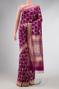 Magenta Dual Tone Banarasi Silk Saree with Zari And Thread Butta on the body and Zari Border displayed on a mannequin