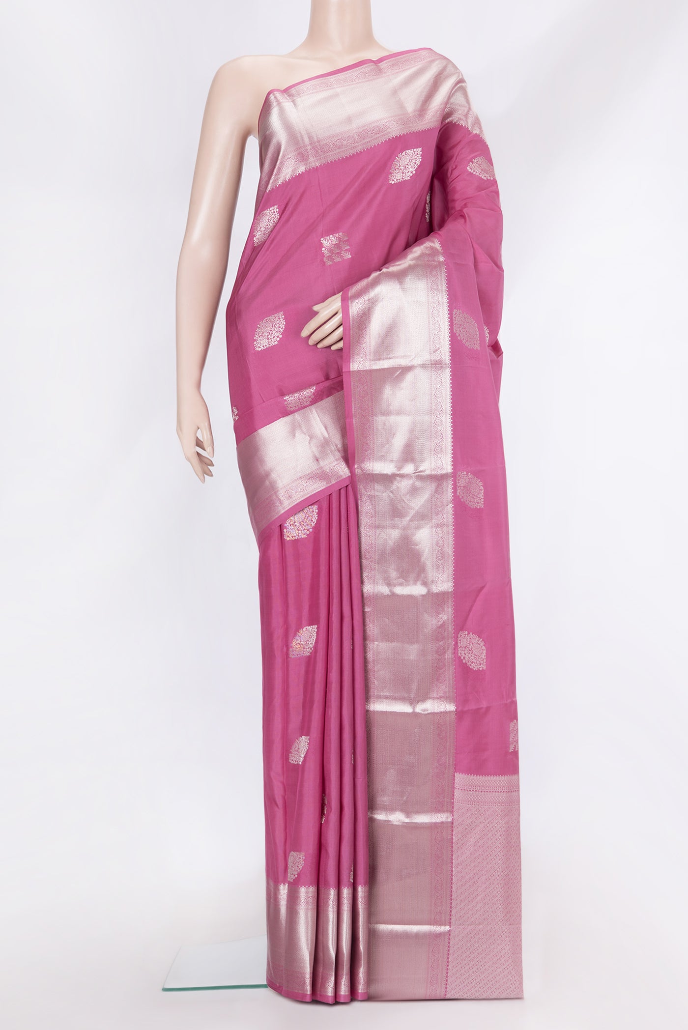Pink Dual Tone Kanchipuram Silk Saree with Zari Butta on the body and Zari Border.  displayed on a mannequin