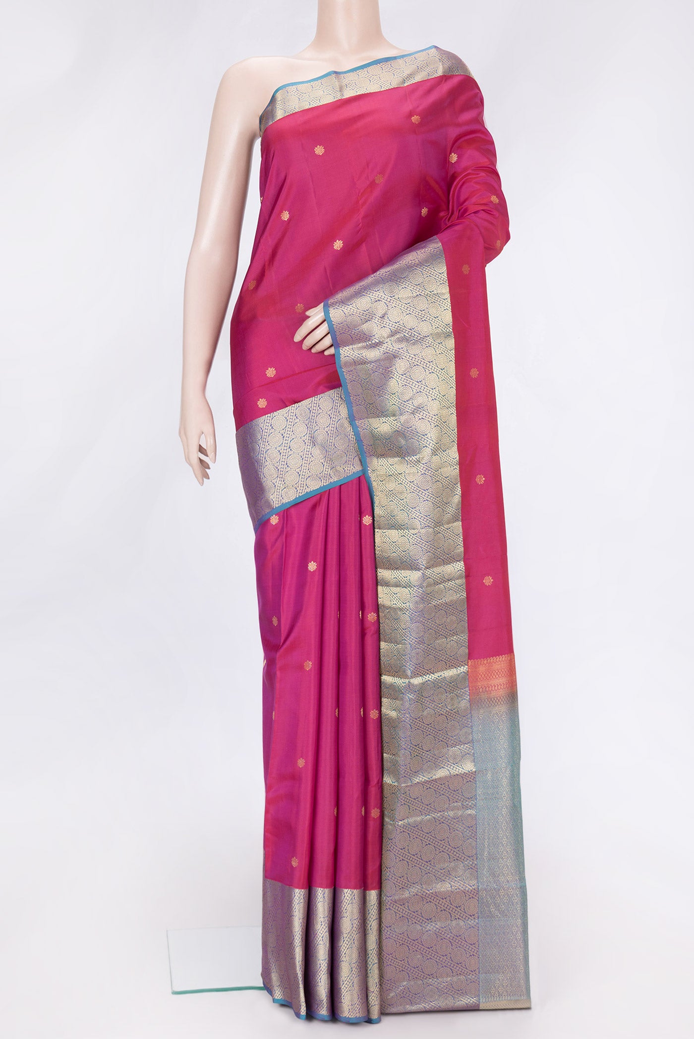 Pink Dual Tone Kanchipuram Silk Saree with Zari Butta on the body and Zari Border.  displayed on a mannequin