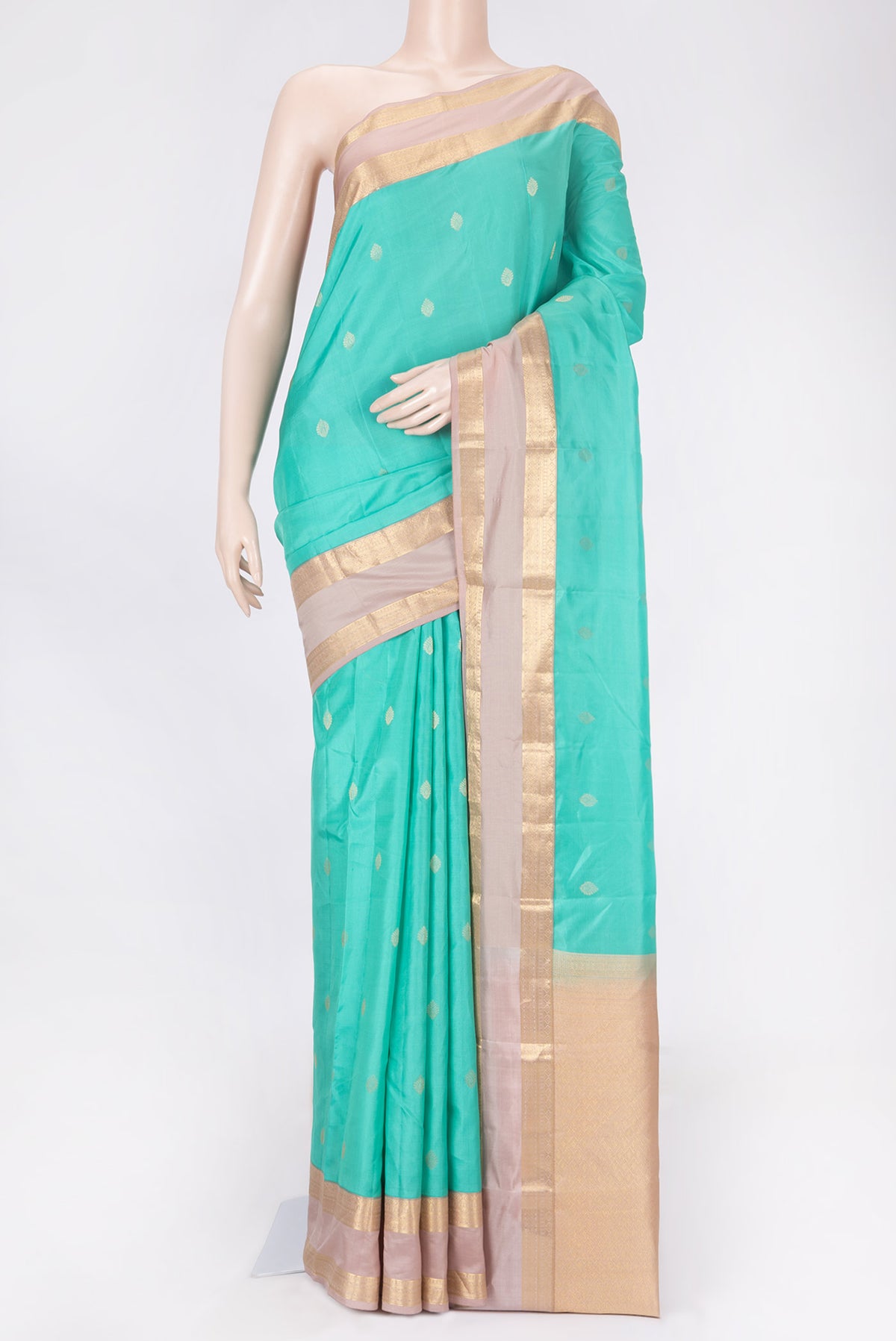 Sea Green Dual Tone Kanchipuram Saree with Zari Butta on the body and Zari Border displayed on a mannequin