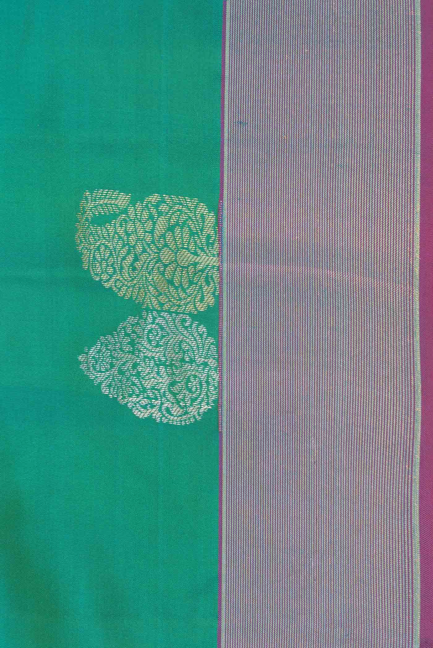 Border image of Green Dual Tone Kanchipuram Saree with Zari Butta on the body and Zari Border