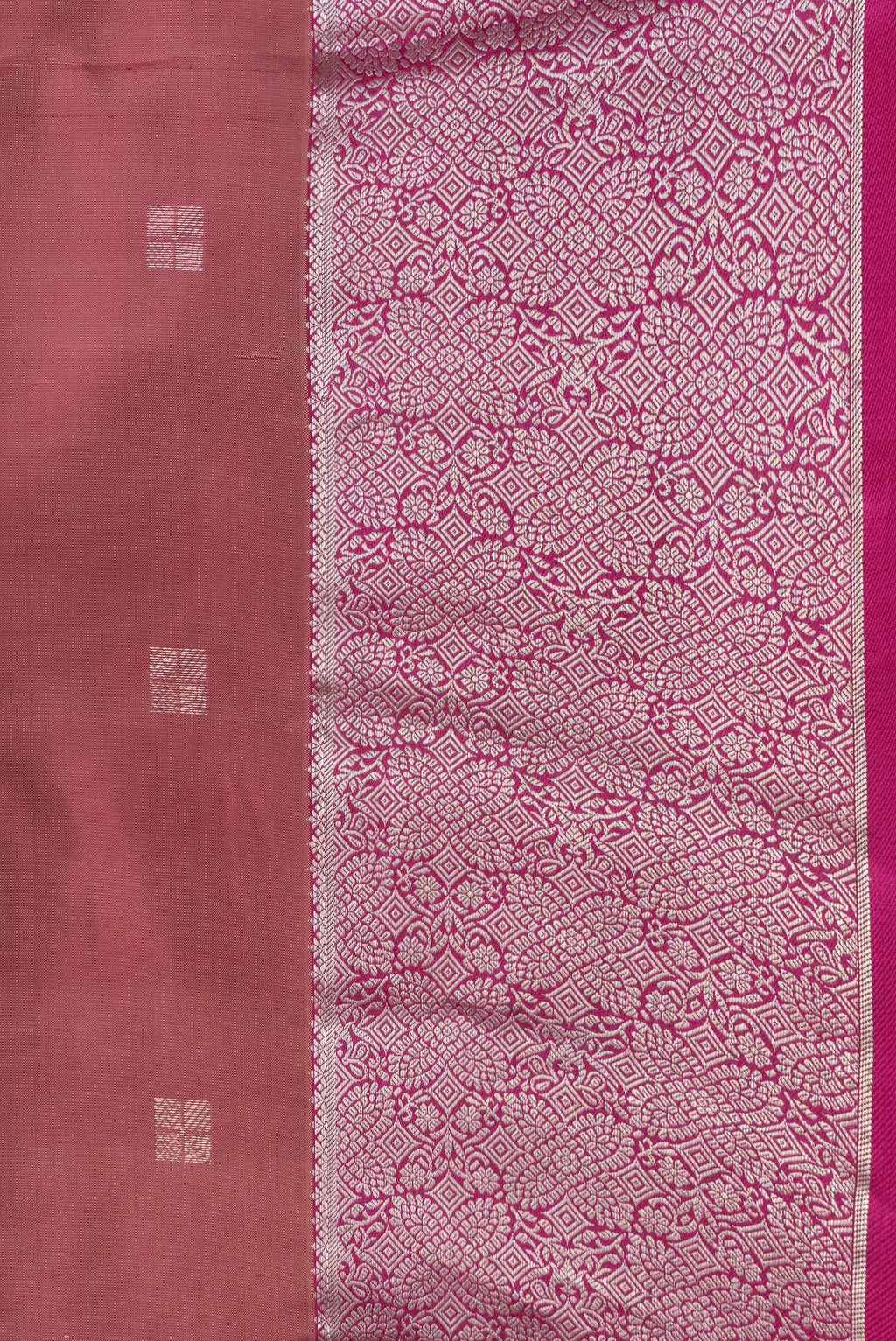 Border image of Brown Dual Tone Kanchipuram Silk Saree with Zari Butta on the body and Zari Border. 