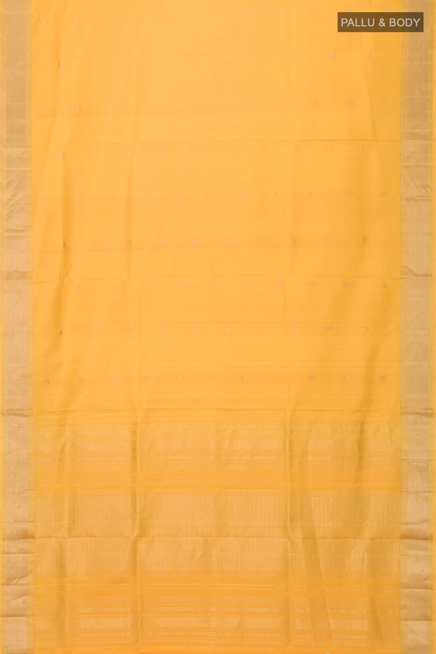 Flat view of Yellow Soft Silk Saree with Zari Butta on the body and Zari Border