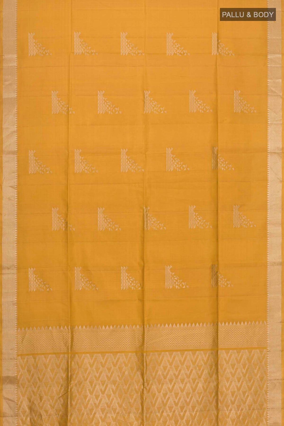 Flat view of Mustard Soft Silk Saree with Zari Butta on the body and Zari Border