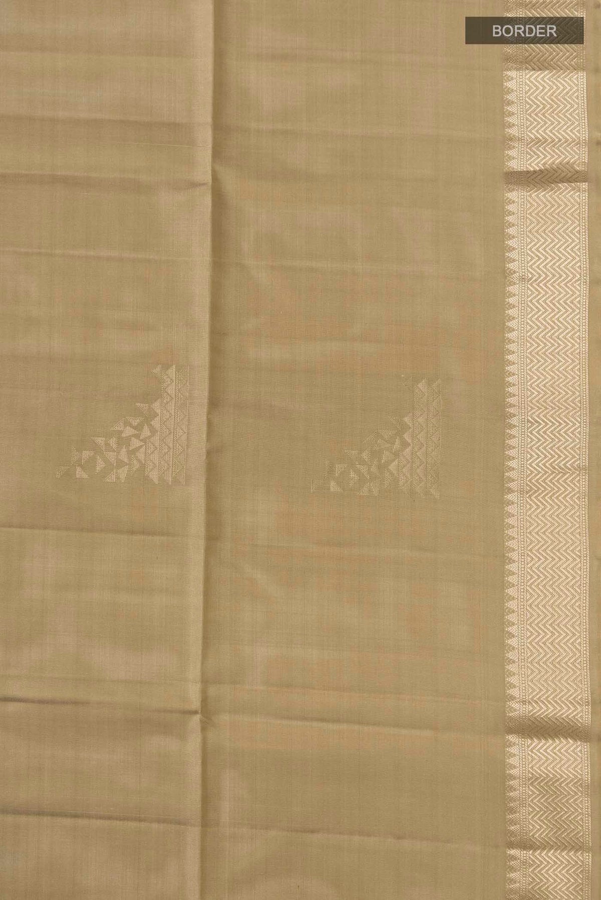 Border image of Beige Soft Silk Saree with Zari Butta on the body and Zari Border