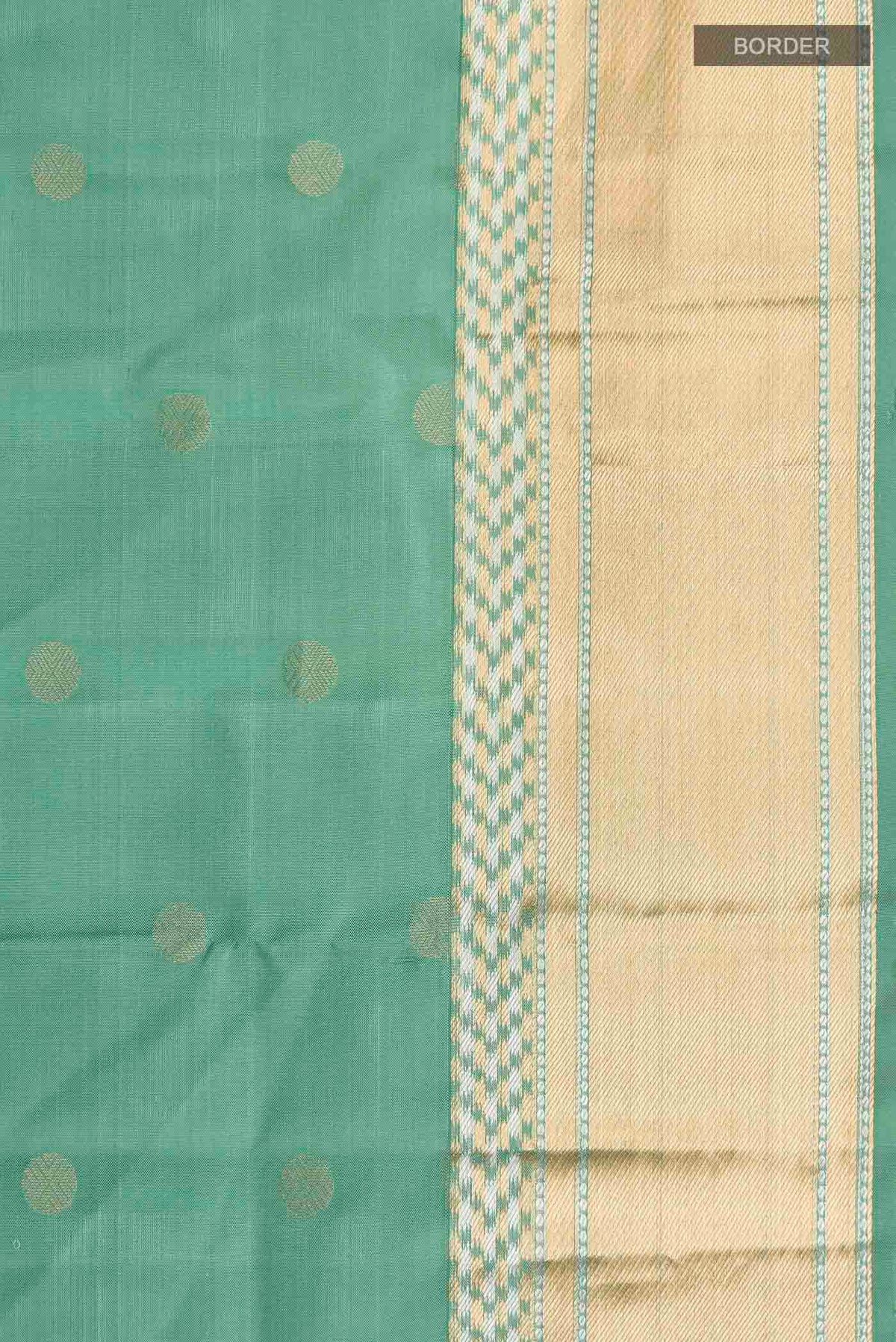 Border image of Green Soft Silk Saree with Zari Butta on the body and Zari Border