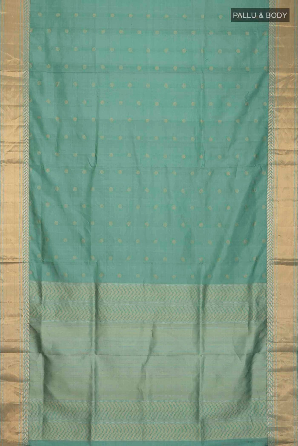Flat view of Green Soft Silk Saree with Zari Butta on the body and Zari Border