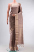 Grey Soft Silk Saree with Zari Butta on the body and Zari Border displayed on a mannequin