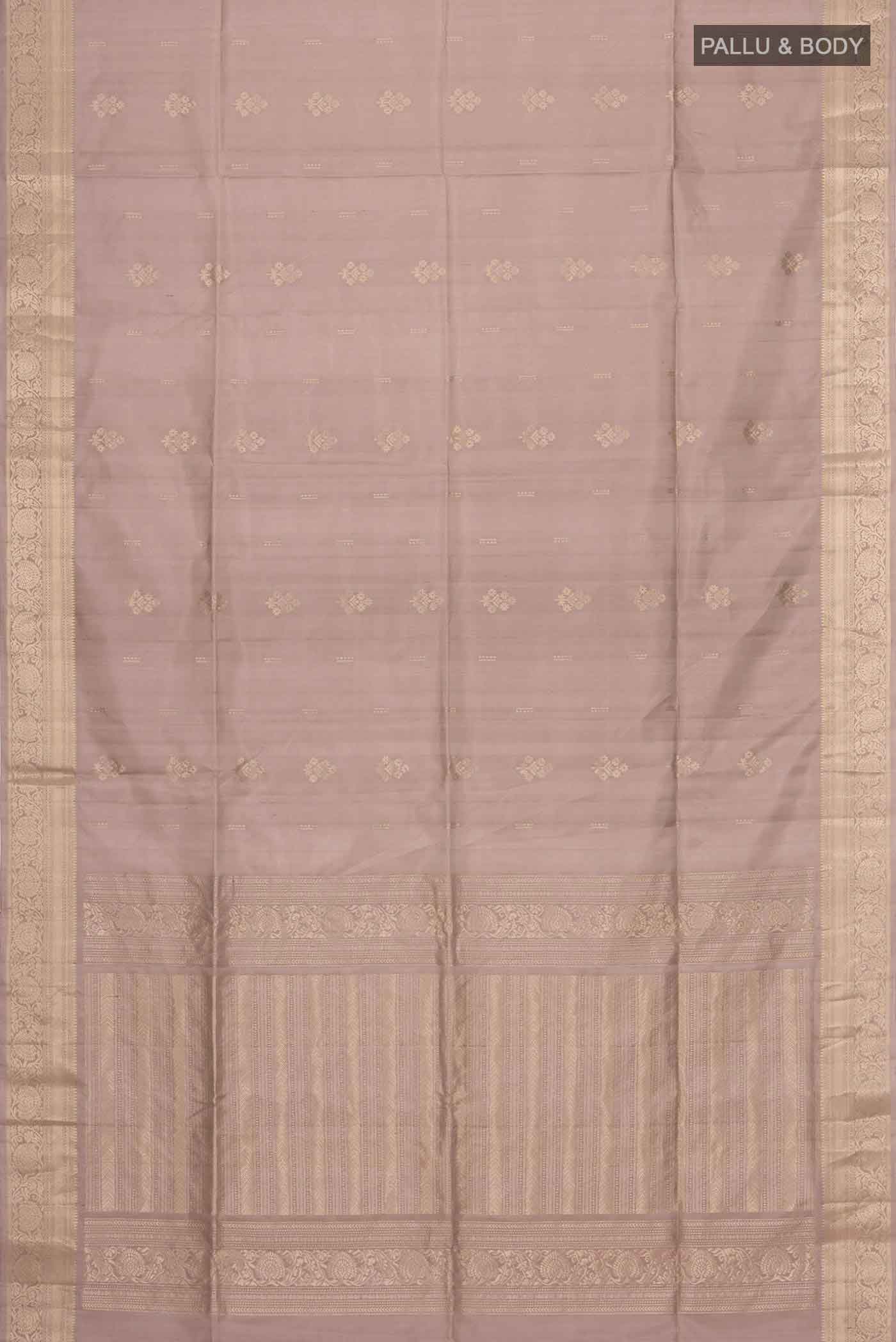 Flat view of Grey Soft Silk Saree with Zari Butta on the body and Zari Border