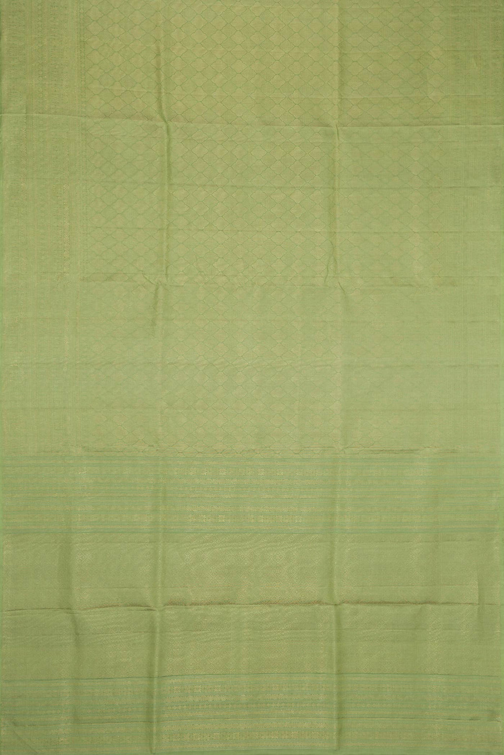 Flat view of Pista Green Dual Tone Soft Silk Saree with Zari Brocade on the body and Zari Border. 