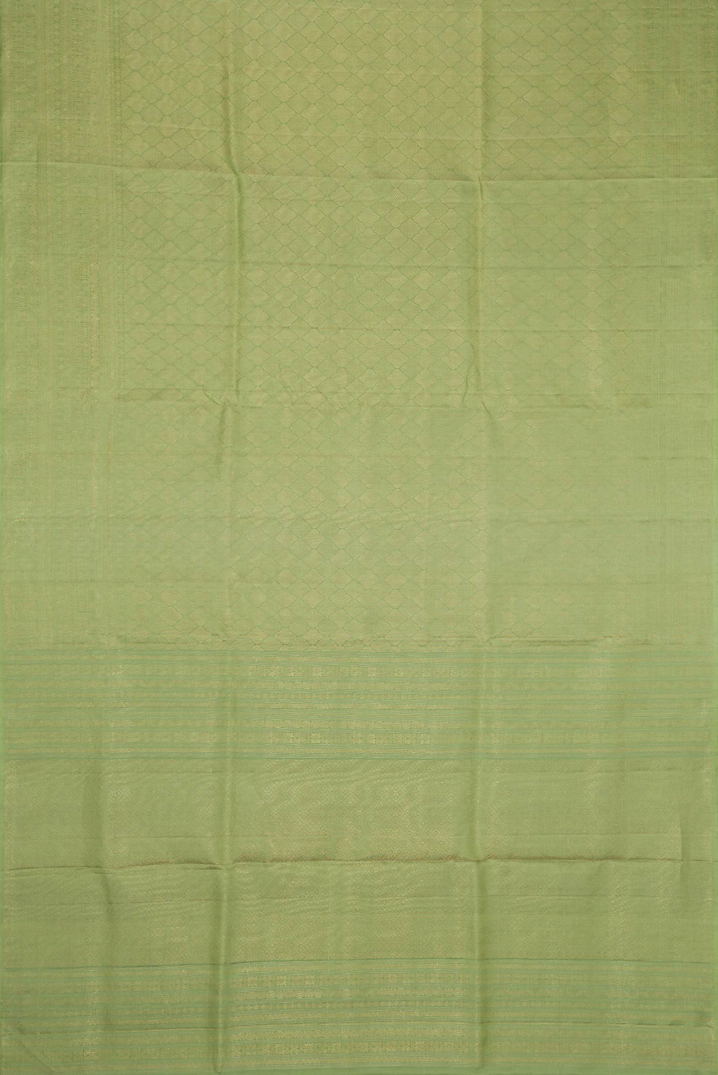 Flat view of Pista Green Dual Tone Soft Silk Saree with Zari Brocade on the body and Zari Border. 