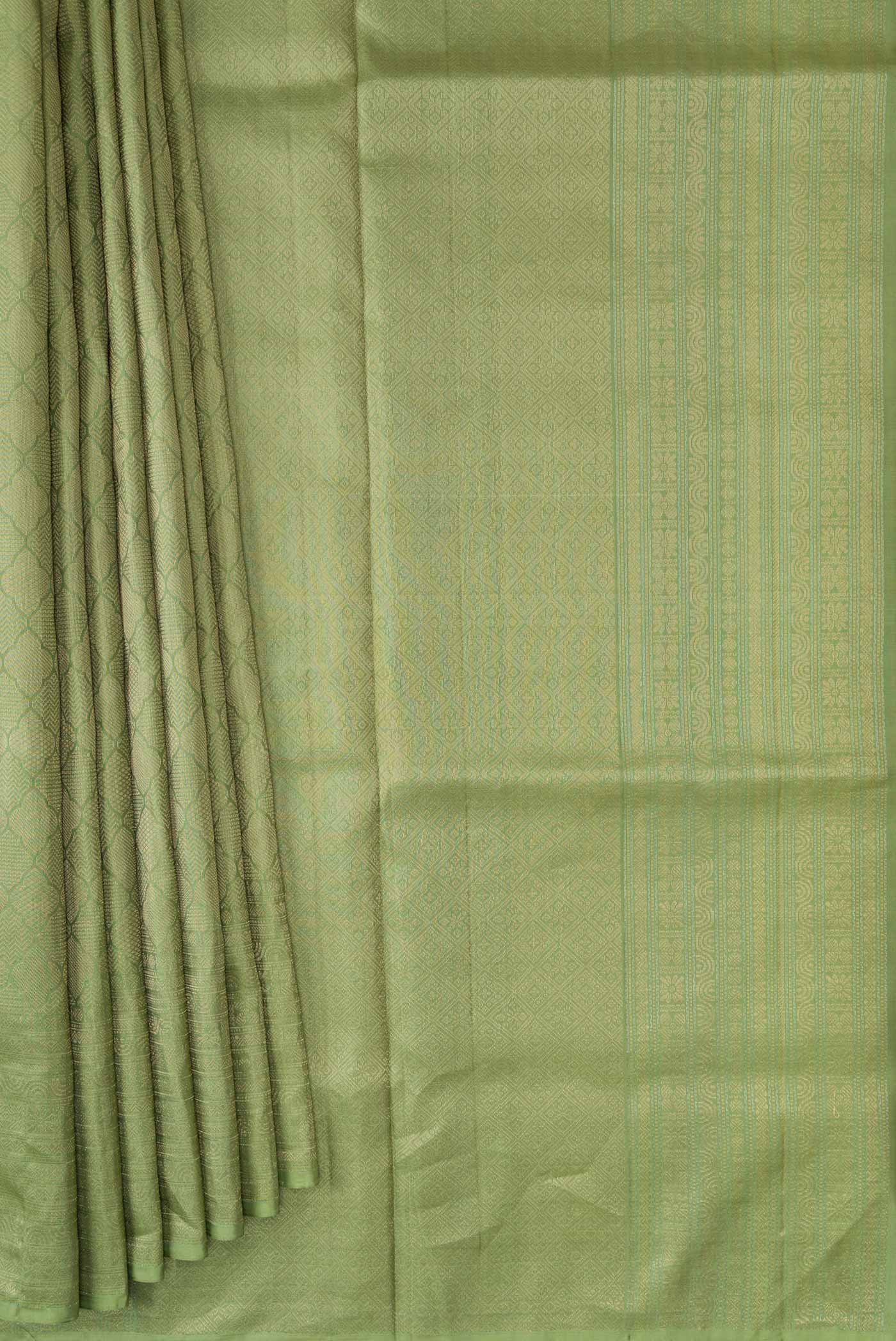 Pleats and pallu of Pista Green Dual Tone Soft Silk Saree with Zari Brocade on the body and Zari Border. 