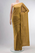 Mustard Soft Silk Saree with Zari Brocade on the body and Zari Border displayed on a mannequin