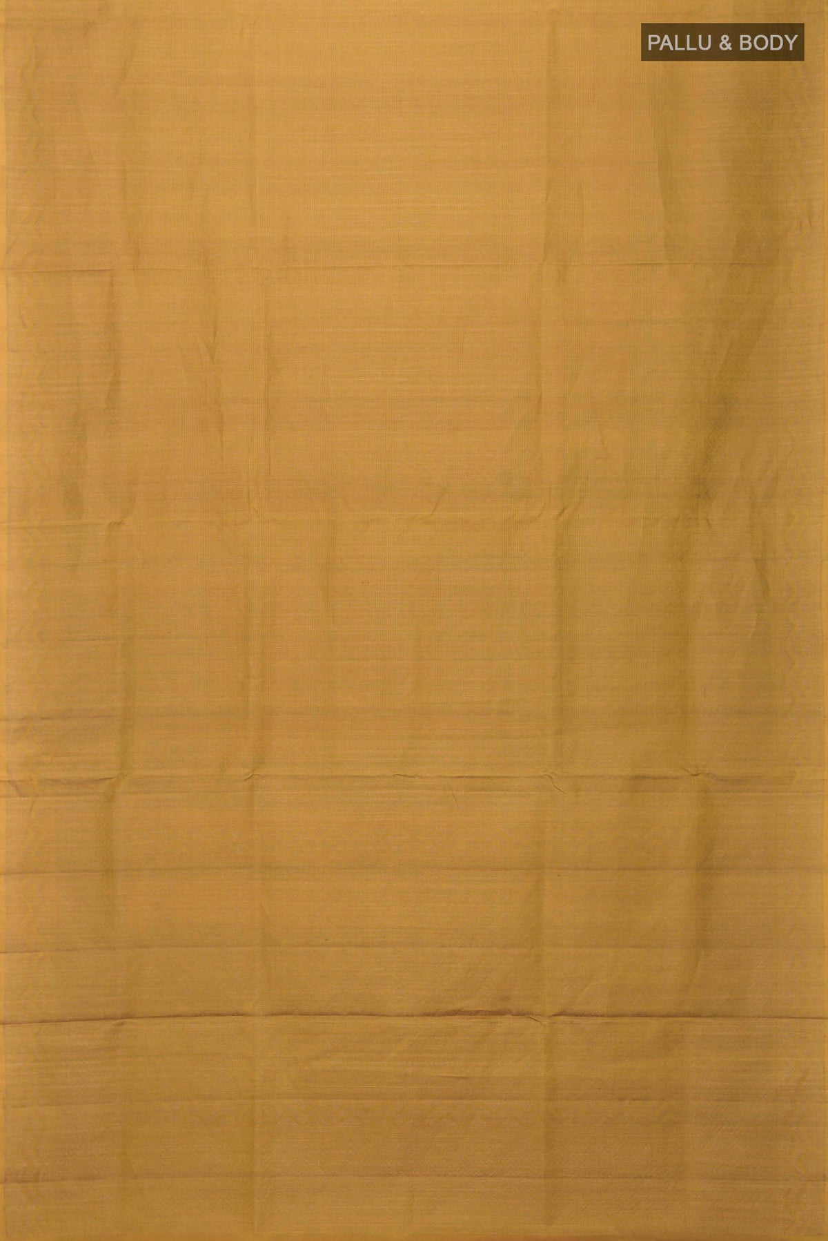 Flat view of Mustard Soft Silk Saree with Zari Brocade on the body and Zari Border