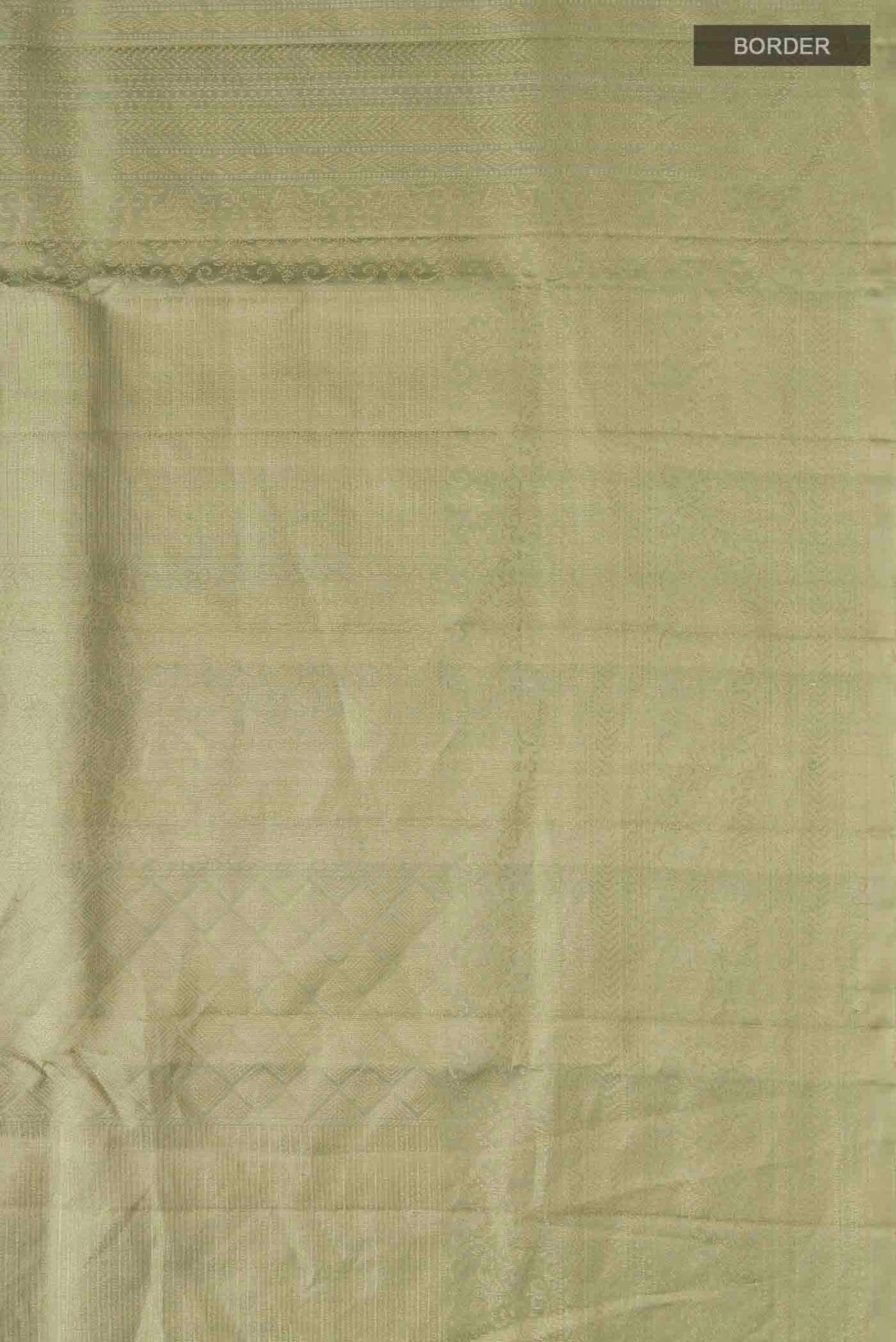 Border image of Green Soft Silk Saree with Zari Butta on the body and Zari Border