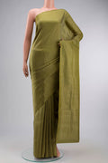 Green Soft Silk Saree with Zari Brocade on the body and Zari Border displayed on a mannequin