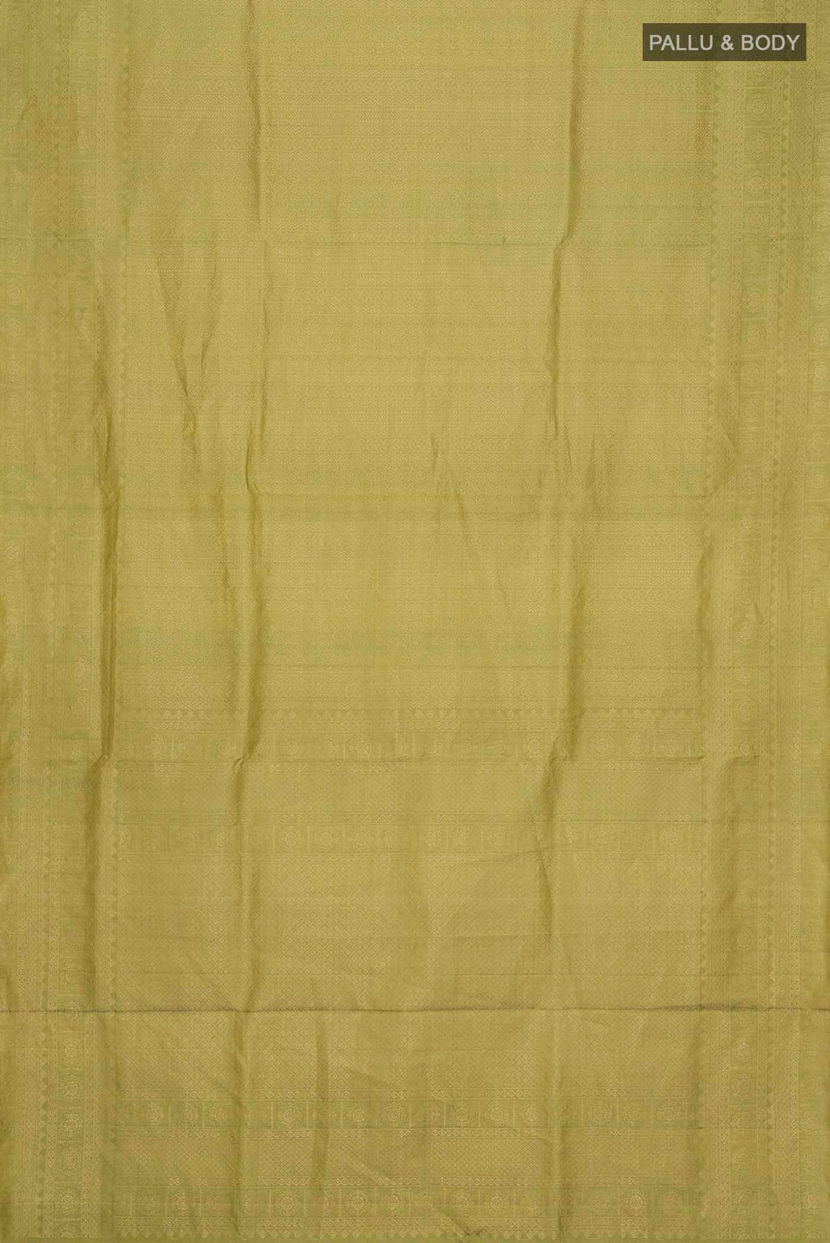 Flat view of Green Soft Silk Saree with Zari Brocade on the body and Zari Border