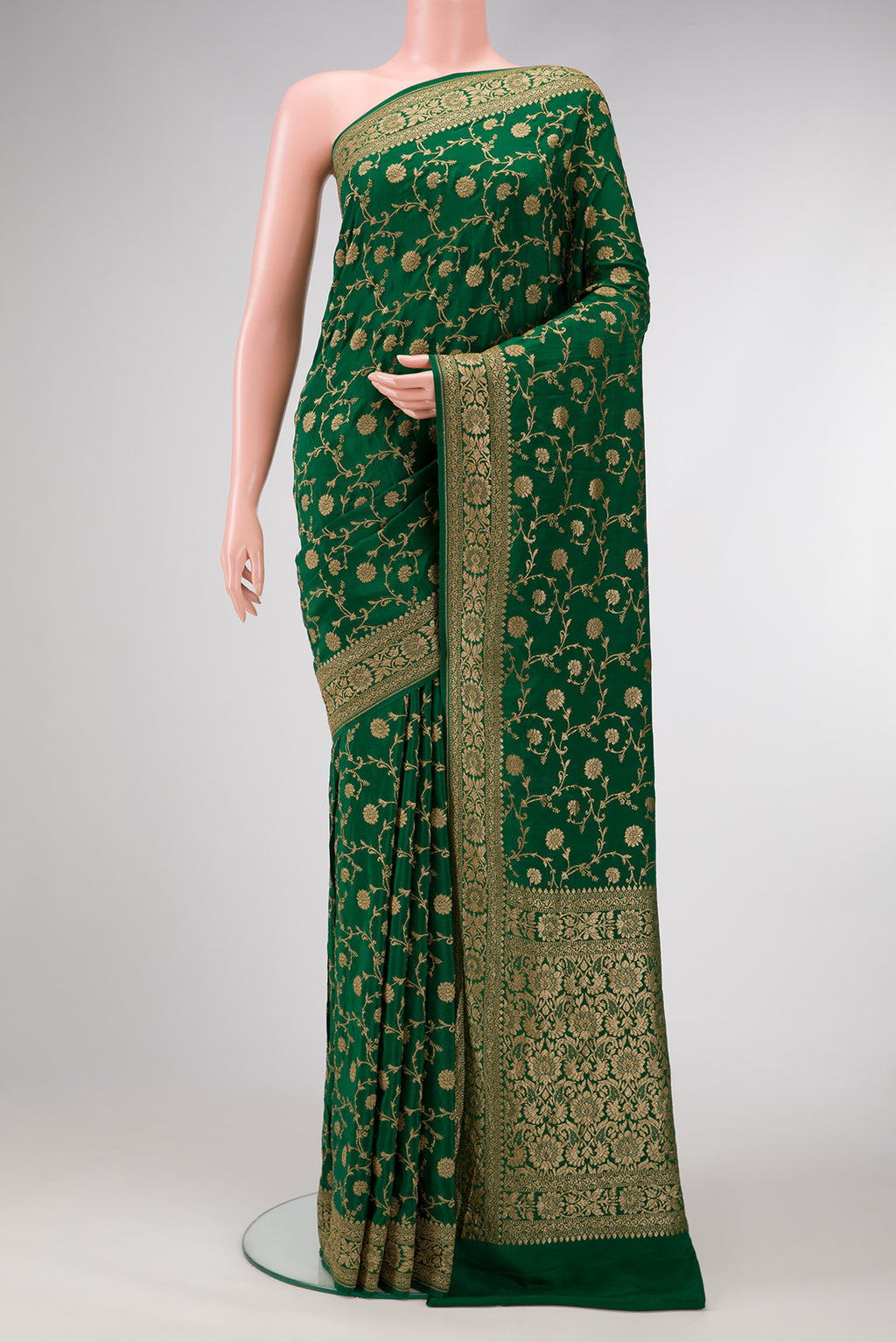 Bottle Green Dual Tone Mysore Georgette Saree with Zari Brocade on the body and Zari Border.  displayed on a mannequin