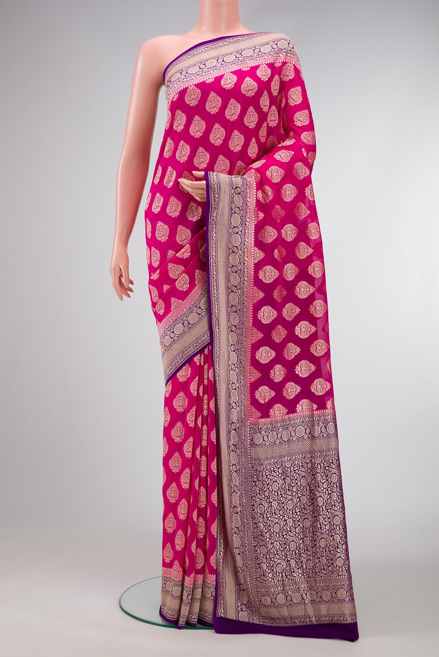 Pink Dual Tone Banarasi Georgette Saree with Zari Butta on the body and Zari Border.  displayed on a mannequin