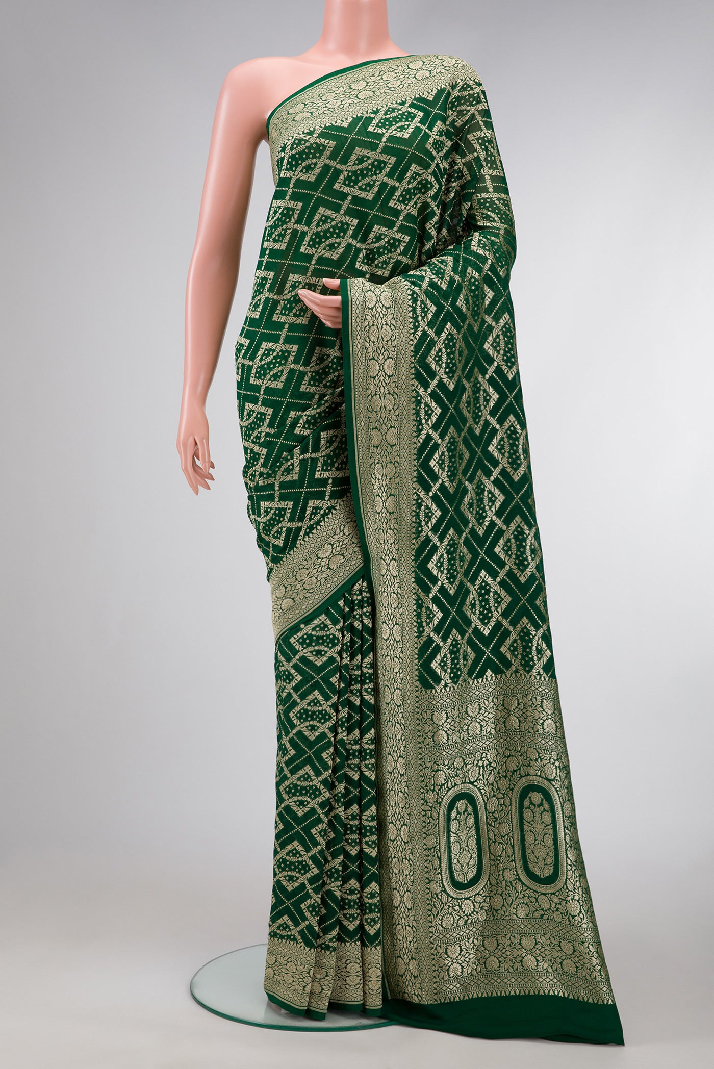 Bottle Green Dual Tone Banarasi Georgette Saree with Zari Brocade on the body and Zari Border.  displayed on a mannequin