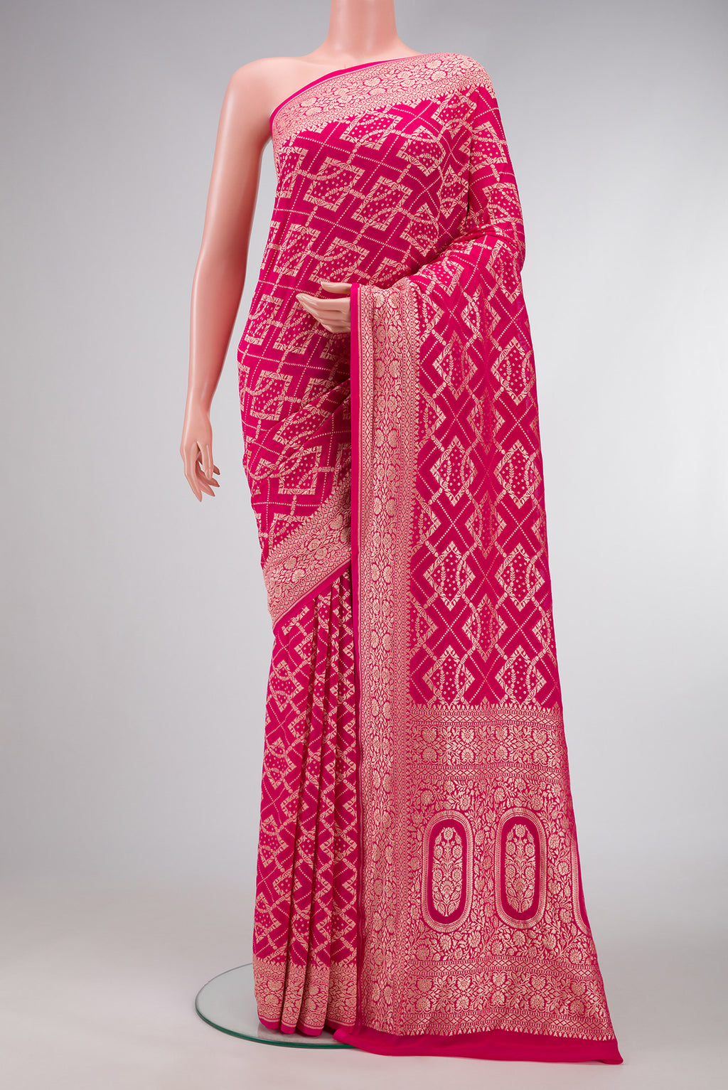Pink Dual Tone Banarasi Georgette Saree with Zari Brocade on the body and Zari Border.  displayed on a mannequin