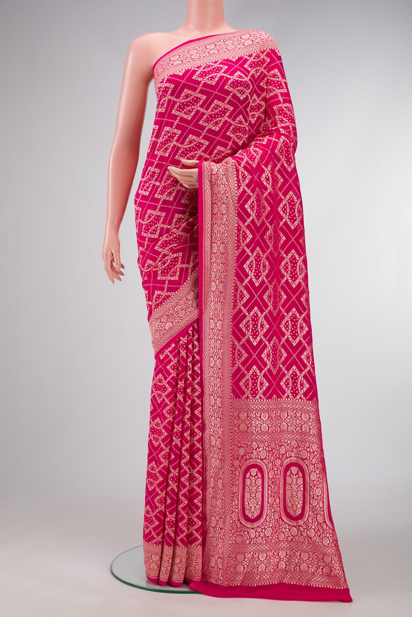 Pink Dual Tone Banarasi Georgette Saree with Zari Brocade on the body and Zari Border.  displayed on a mannequin